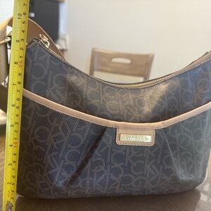 Calvin Klein Monogrammed Brown and Tan Shoulder Bag